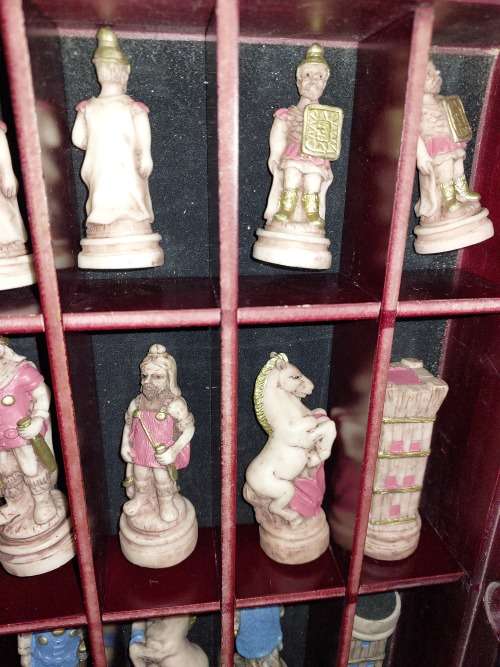 A VINTAGE CHESS BOARD AND STORAGE COMPARTMENT WITH ALL THE PIECES COMPLETE SET PIECES ARE CERAMIC