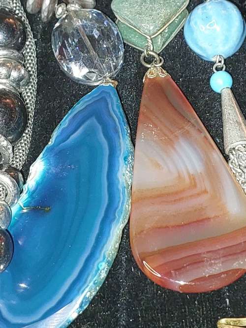A BULK COLLECTION OF SILVERPLATED AND STAINLESS STEEL, MURANO GLASS, AND OTHER SEMI PRECIOUS GEM ST