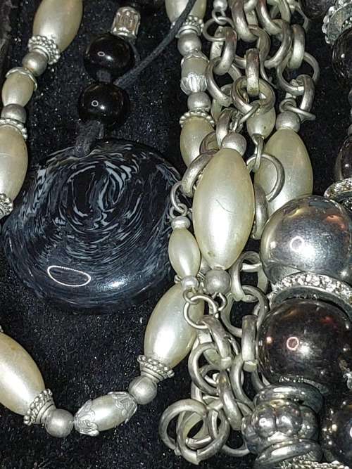 A BULK COLLECTION OF SILVERPLATED AND STAINLESS STEEL, MURANO GLASS, AND OTHER SEMI PRECIOUS GEM ST