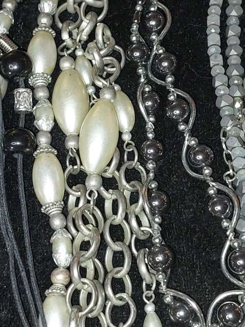 A BULK COLLECTION OF SILVERPLATED AND STAINLESS STEEL, MURANO GLASS, AND OTHER SEMI PRECIOUS GEM ST