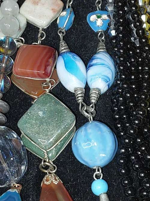 A BULK COLLECTION OF SILVERPLATED AND STAINLESS STEEL, MURANO GLASS, AND OTHER SEMI PRECIOUS GEM ST