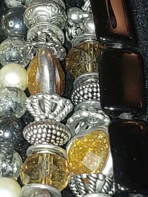 A BULK COLLECTION OF SILVERPLATED AND STAINLESS STEEL, MURANO GLASS, AND OTHER SEMI PRECIOUS GEM ST