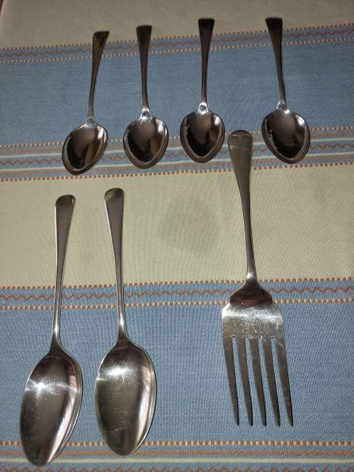 A COLLECTION OF ENGLISH EPNS CUTLERY SOLD AS IS