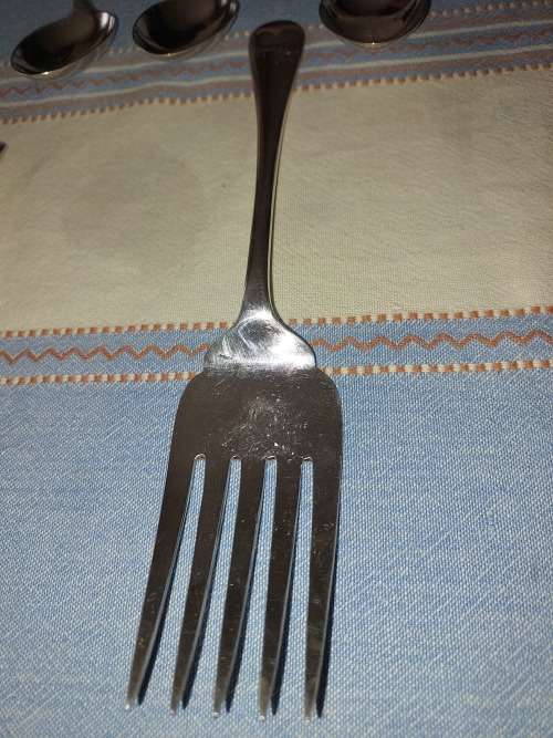 A COLLECTION OF ENGLISH EPNS CUTLERY SOLD AS IS