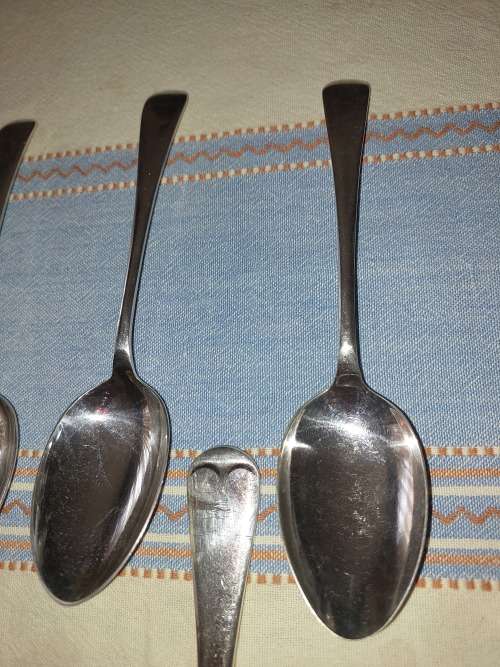A COLLECTION OF ENGLISH EPNS CUTLERY SOLD AS IS