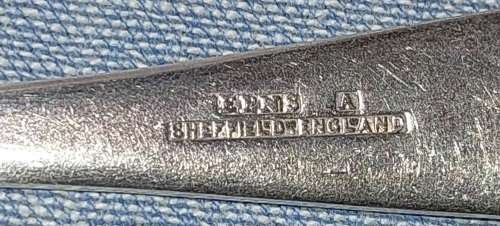 A COLLECTION OF ENGLISH EPNS CUTLERY SOLD AS IS