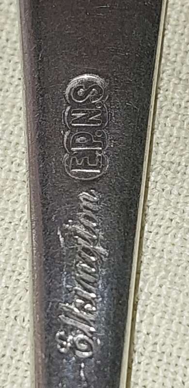 A COLLECTION OF ENGLISH EPNS CUTLERY SOLD AS IS