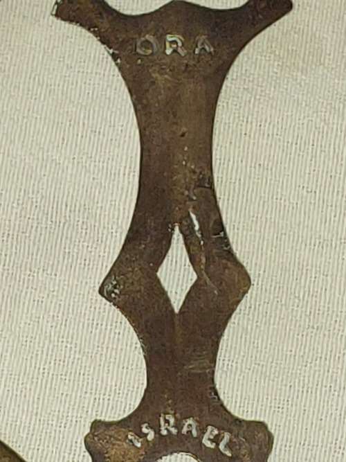 A SET OF 4 BRASS KITCHEN ORNAMENTAL CUTLERY MADE IN ISREAL SOLD AS IS