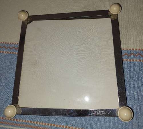 A VINTAGE ART DECOR HOT POT STAND SOLD AS IS