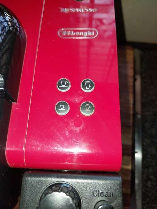 A USED IN PERFECT CONDITION DELINGI TREVISO ITALIA TYPE EN520.R COFFEE MACHINE MADE IN ITALY RED IN