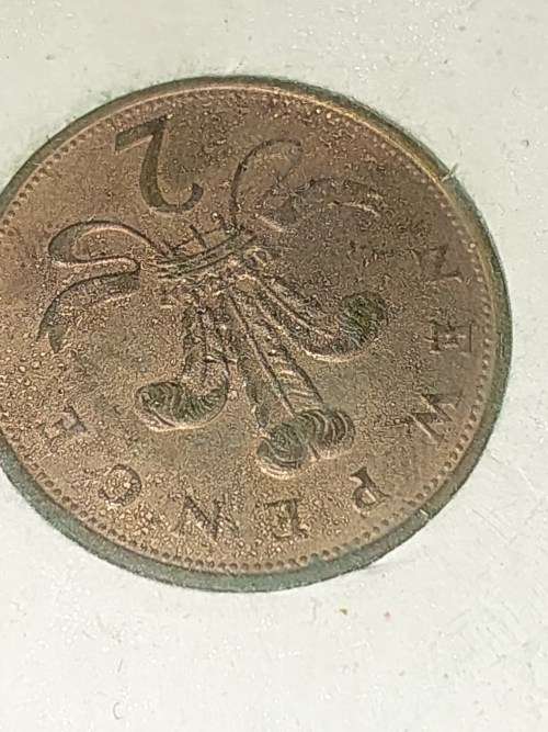 AN ANTIQUE COLLECTION OF BRITISH COINS SOLD AS IS