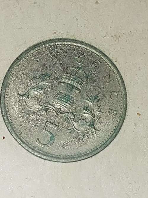 AN ANTIQUE COLLECTION OF BRITISH COINS SOLD AS IS