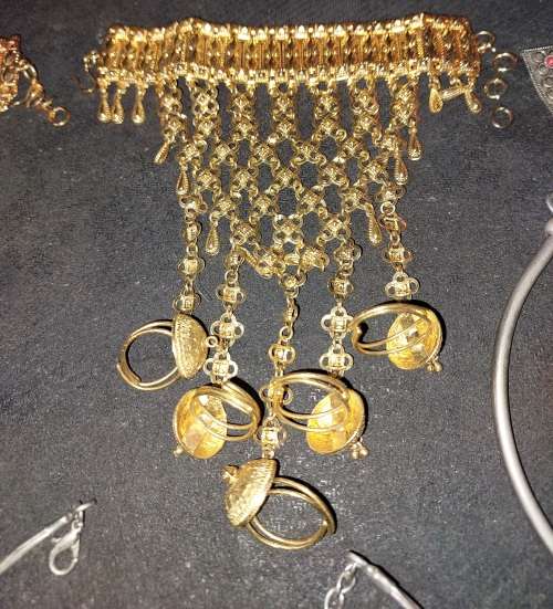 A COLLECTION OF ASIAN BRIDAL JEWELRY SOLD AS IS