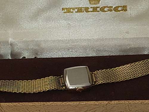 AN ANTIQUE TISSOT SAPHIR GOLD PLATED WITH THE CRYSTAL GLASS SOLD AS IS NOT TESTED