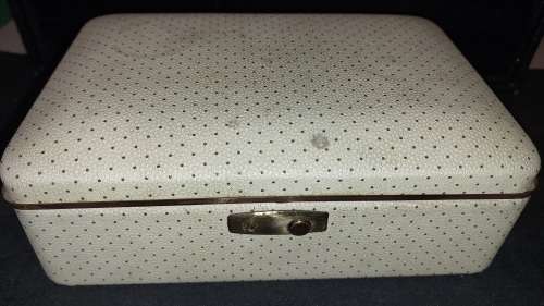 A VINTAGE METAL WITH LEATHER TYPE COVER SOLD AS IS NO KEYS