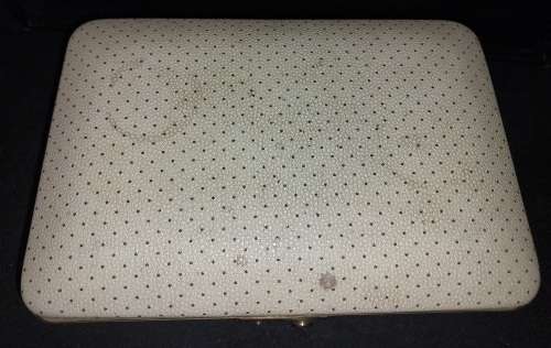 A VINTAGE METAL WITH LEATHER TYPE COVER SOLD AS IS NO KEYS
