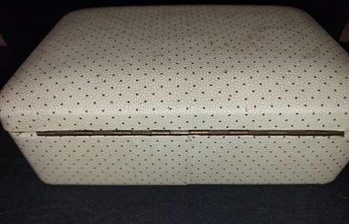 A VINTAGE METAL WITH LEATHER TYPE COVER SOLD AS IS NO KEYS
