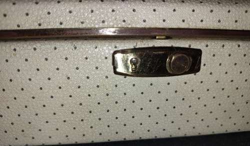 A VINTAGE METAL WITH LEATHER TYPE COVER SOLD AS IS NO KEYS