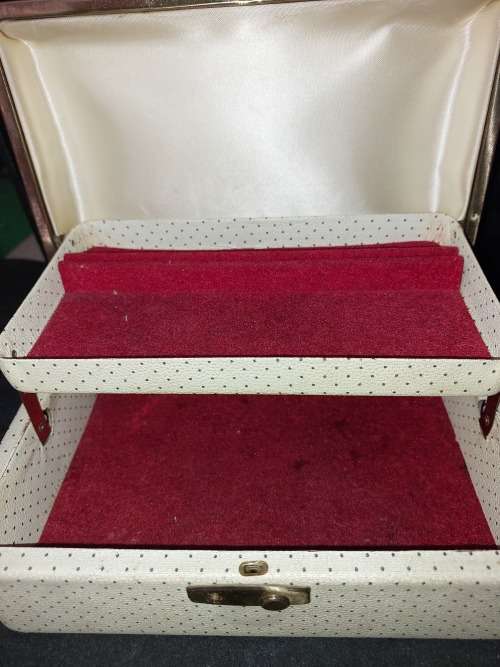 A VINTAGE METAL WITH LEATHER TYPE COVER SOLD AS IS NO KEYS