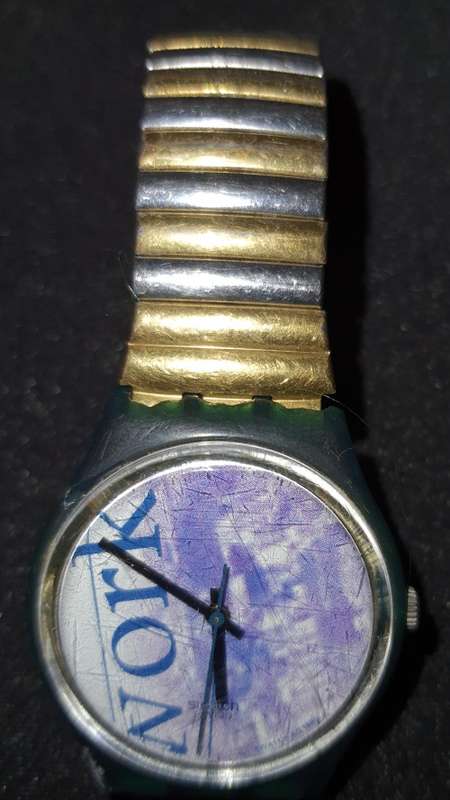 A SWATCH VINTAGE WRIST WATCH WORKING SOLD AS IS