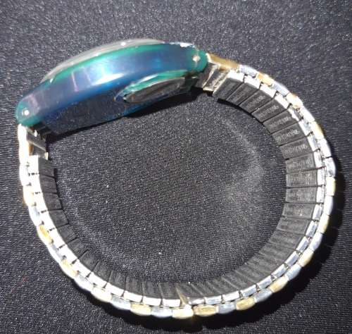 A SWATCH VINTAGE WRIST WATCH WORKING SOLD AS IS