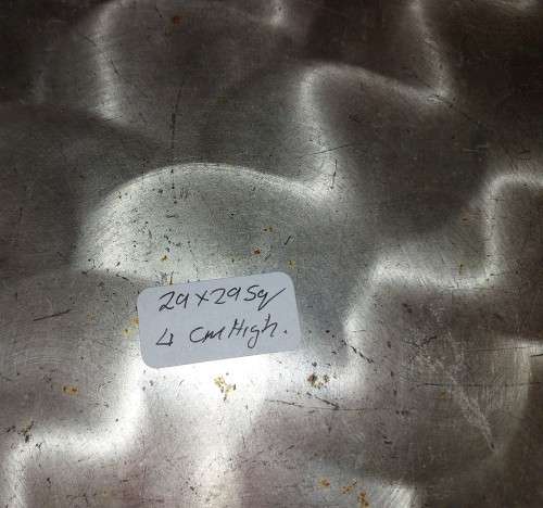 A VINTAGE SILVER PLATED SQUARE SERVING TRAY SOLD AS IS