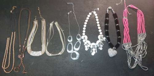 AN IMMIGRATING LADY`S QUALITY COLLECTION OF COSTUME NECKLACES SOLD AS IS