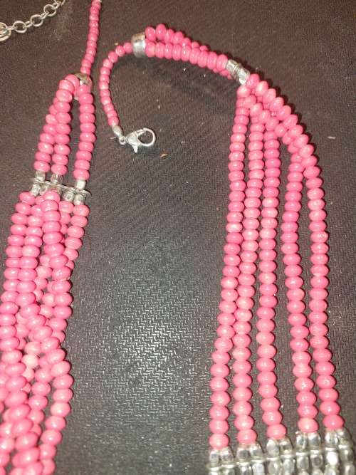AN IMMIGRATING LADY`S QUALITY COLLECTION OF COSTUME NECKLACES SOLD AS IS
