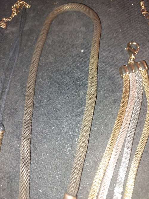 AN IMMIGRATING LADY`S QUALITY COLLECTION OF COSTUME NECKLACES SOLD AS IS