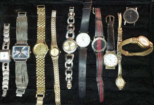 A VINTAGE JOB LOT FASHION WOMANS WATCHES SOLD AS IS NOT TESTED