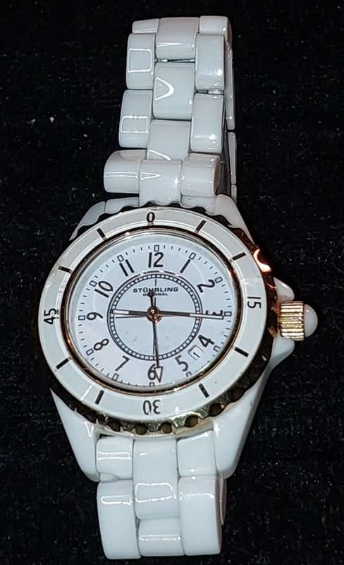 A RARE STRUHRLING ORIGINAL WHITE CERAMIC AND SAFFIRE CRYSTAL WRIST WATCH