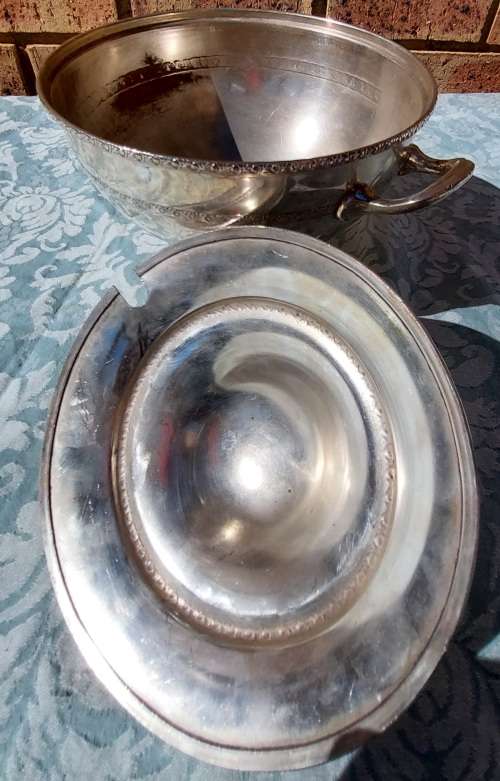 A VINTAGE SERANCO SILVERPLATED ON COPPER TURINE SOLD AS IS