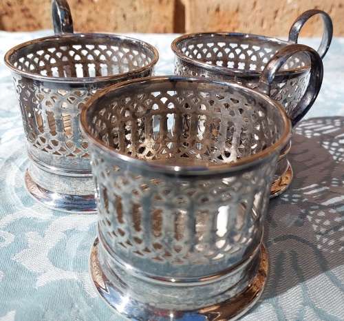 A SET OF 3 TEA GLASS HOLDER EPNS IN GOOD CONDITION SOLD AS IS