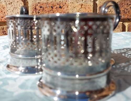 A SET OF 3 TEA GLASS HOLDER EPNS IN GOOD CONDITION SOLD AS IS