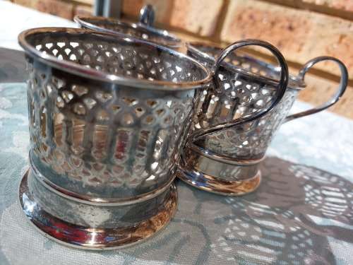 A SET OF 3 TEA GLASS HOLDER EPNS IN GOOD CONDITION SOLD AS IS