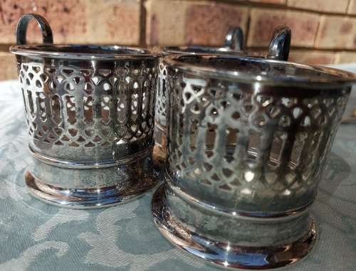 A SET OF 3 TEA GLASS HOLDER EPNS IN GOOD CONDITION SOLD AS IS
