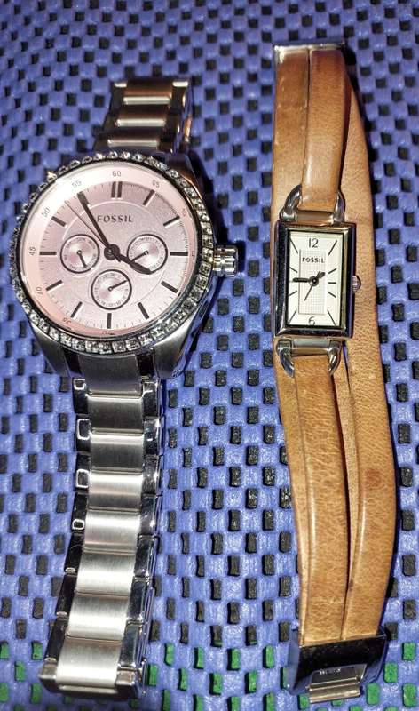 TWO PRISTINE FOSSIL WATCHES SOLD AS IS NOT TESTED