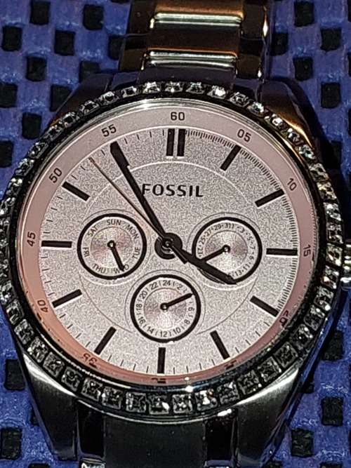 TWO PRISTINE FOSSIL WATCHES SOLD AS IS NOT TESTED