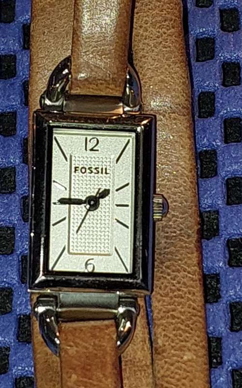 TWO PRISTINE FOSSIL WATCHES SOLD AS IS NOT TESTED
