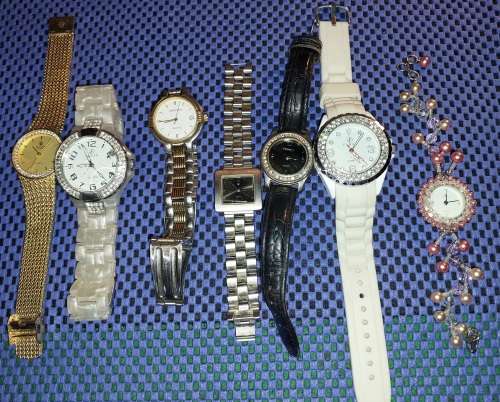 A COLLECTION OF COSTUME WOMANS WRIST WATCHES SOLD AS IS NOT TESTED