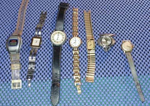 A COLLECTION OF RARE QUALITY COSTUME WATCHES SOLD AS IS