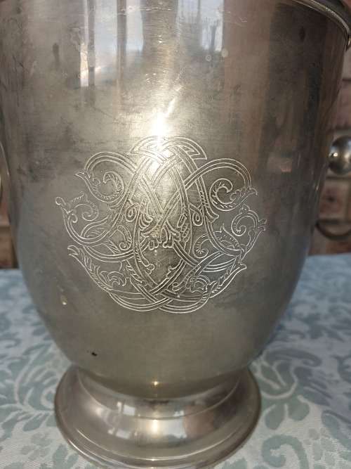 A VINTAGE SILVER PLATED ON BRONZE ICE BUCKET WITH HANDLES