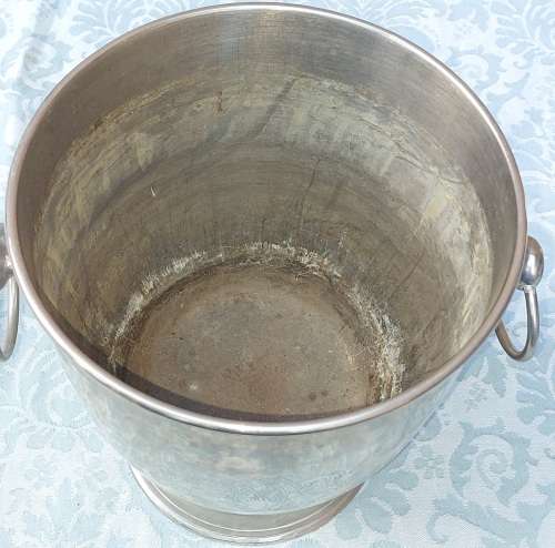 A VINTAGE SILVER PLATED ON BRONZE ICE BUCKET WITH HANDLES