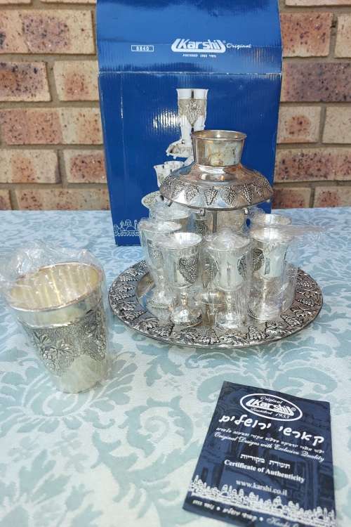AN EXCLUSIVE QUALITY NEVER BEEN-USED KIDDUSH SET