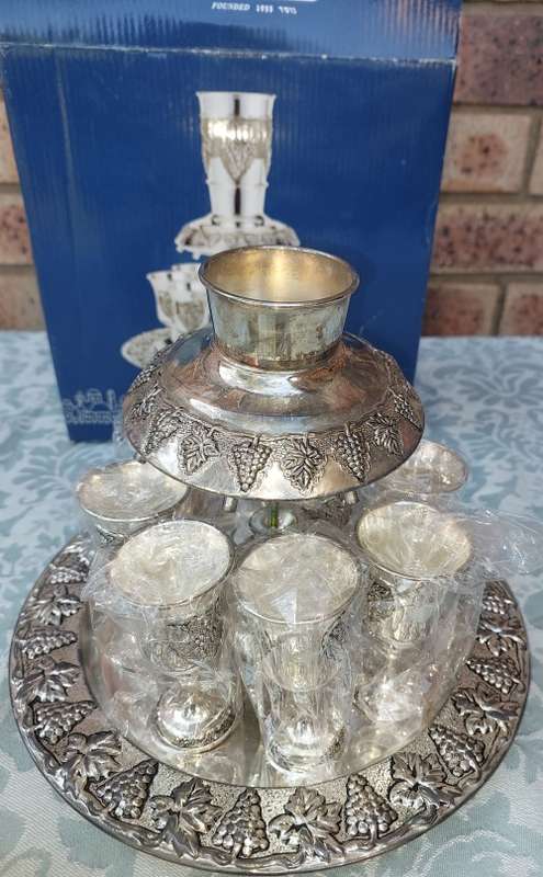AN EXCLUSIVE QUALITY NEVER BEEN-USED KIDDUSH SET