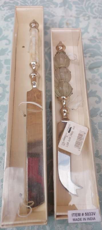 TWO ART DECOR KITCHENALIA , HAND MADE IN INDIA A BREAD KNIFE AND A CHEESE CUTTER SOLD AS IS