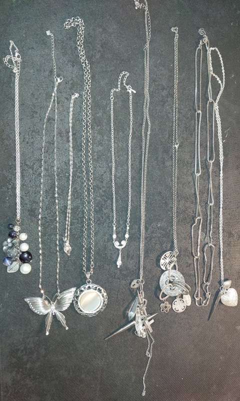 A VINTAGE COLLECTION COSTUME NECKLACES SOLD AS IS