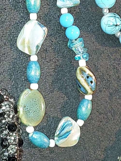 A COLLECTION OF VINTAGE TURQUOISE AND OTHER COSTUME NECKLACES SOLD AS IS
