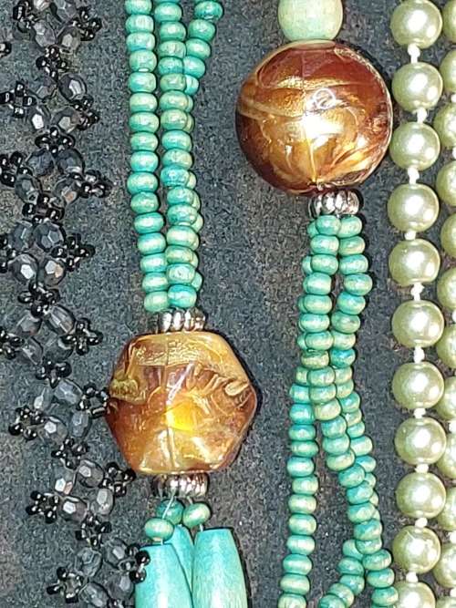 A COLLECTION OF VINTAGE TURQUOISE AND OTHER COSTUME NECKLACES SOLD AS IS