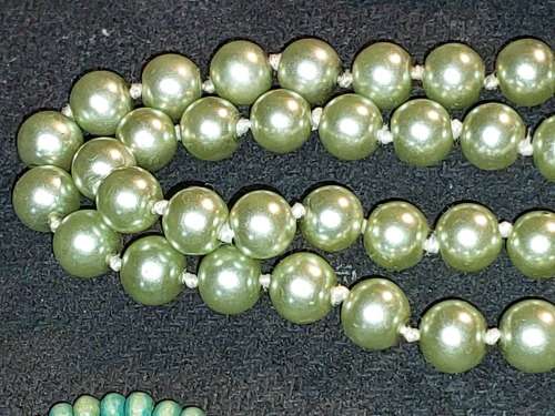 A COLLECTION OF VINTAGE TURQUOISE AND OTHER COSTUME NECKLACES SOLD AS IS